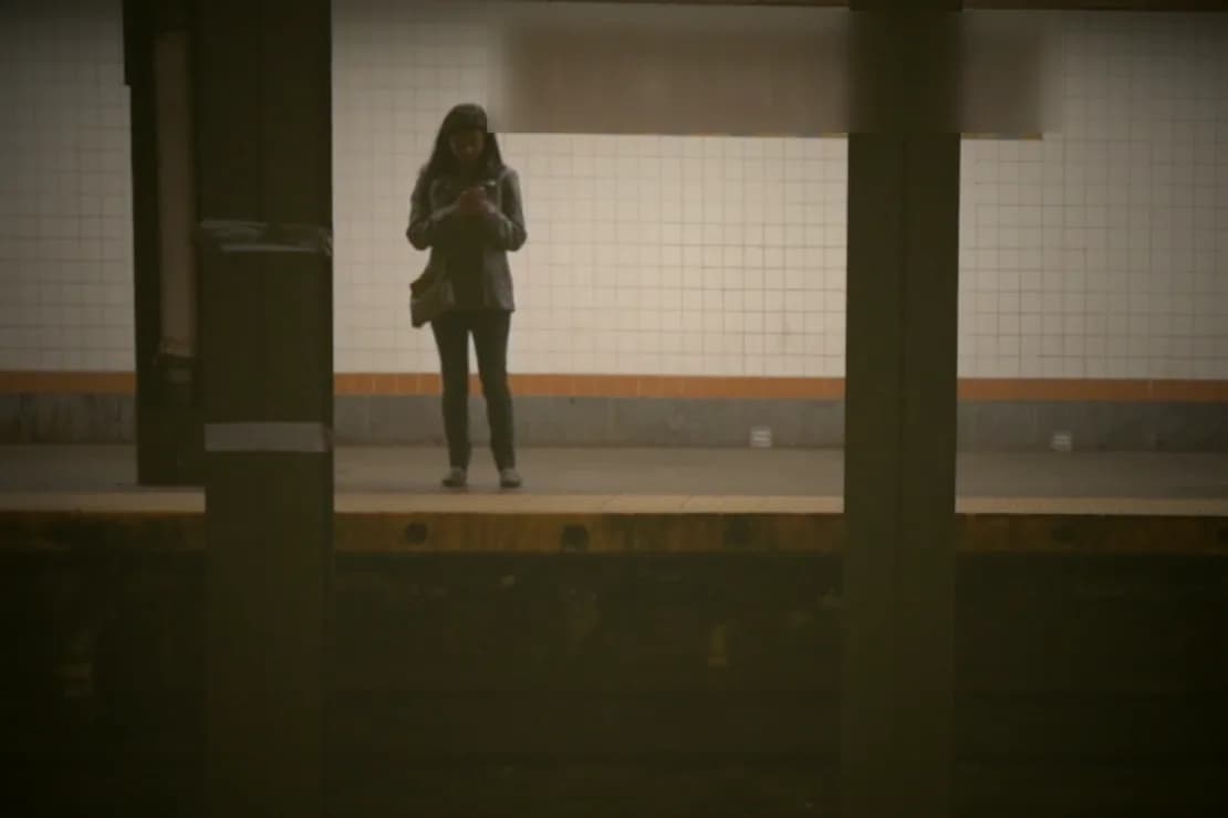 The same platform in warm, faded, grainy film colour.